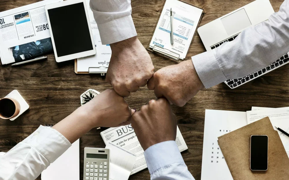 02-Comment-motiver-ses-equipes-a-performer-9-astuces.webp Une équipe motivée après une formation manager débutant